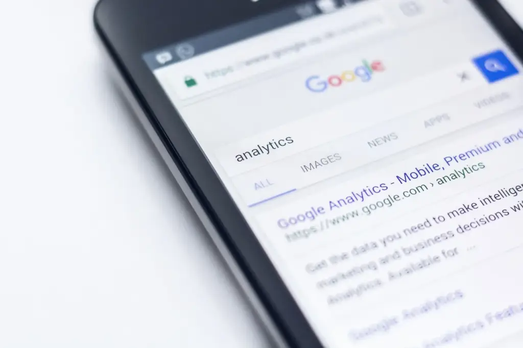 Mobile phone displaying a Google search results page for SERP analysis